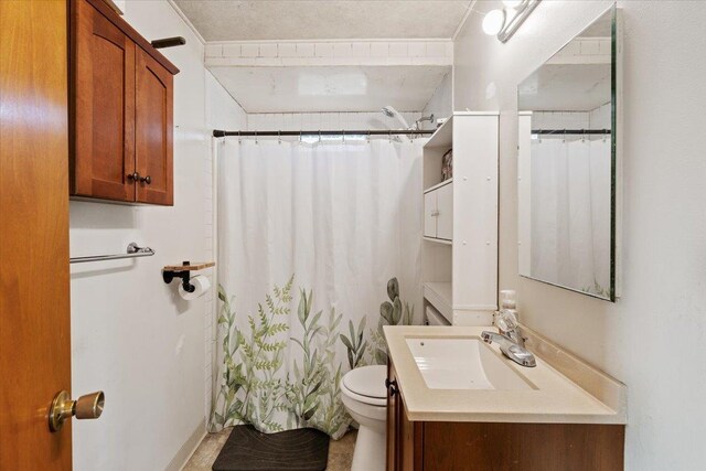 laundry room featuring an AC wall unit, cabinets, electric panel, washing machine and dryer, and a textured ceiling