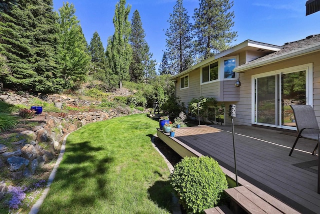 view of yard featuring a deck