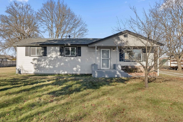 ranch-style house with a front yard