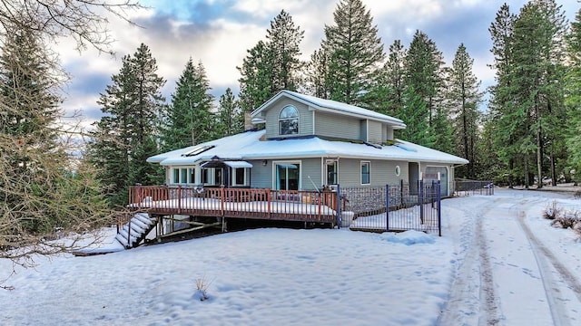 view of front of property featuring a wooden deck