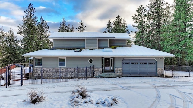 view of front of home with a garage