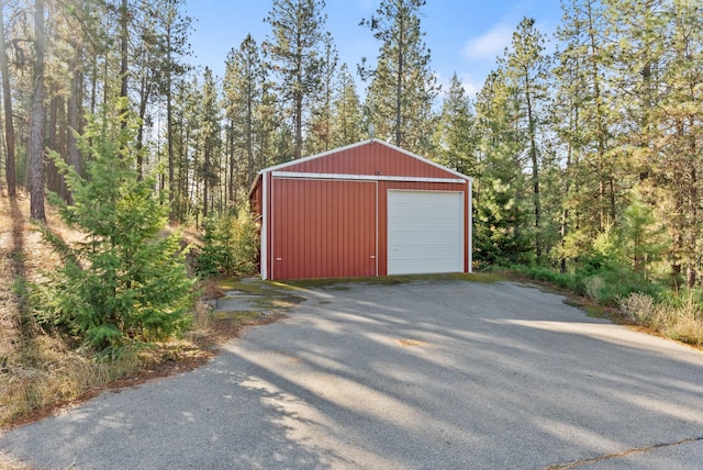 view of outdoor structure with a garage