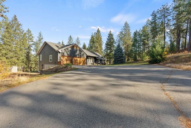 view of property exterior featuring a garage