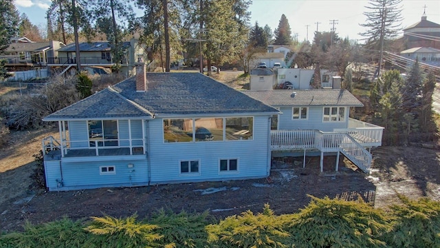 rear view of house with a deck