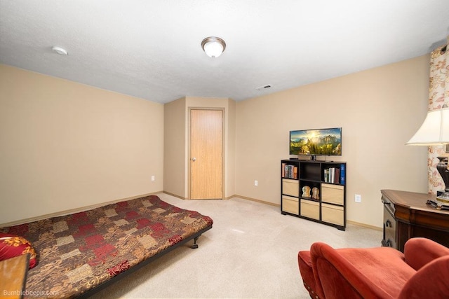 bedroom with light carpet