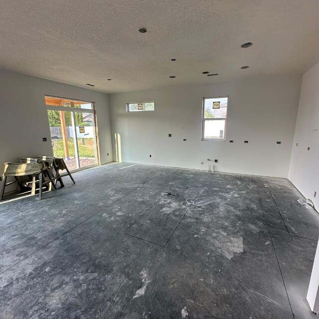 17811 E Nora Ave, Spokane Valley, WA 99016 - kitchen with decorative backsplash, a kitchen breakfast bar, stainless steel appliances, light wood-style floors, and a sink