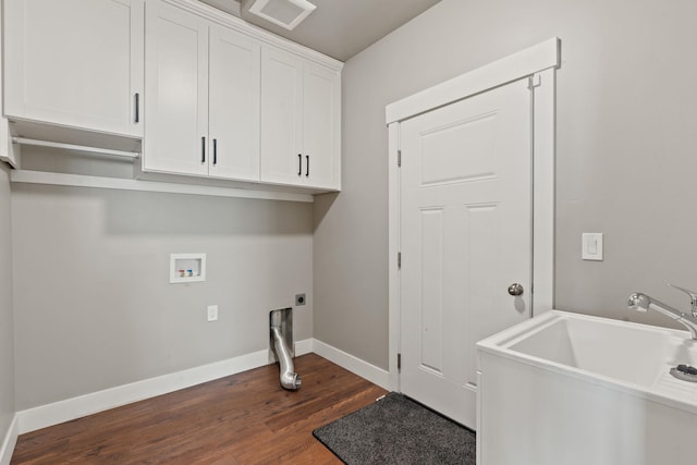 laundry room featuring sink, dark wood-type flooring, electric dryer hookup, hookup for a washing machine, and cabinets