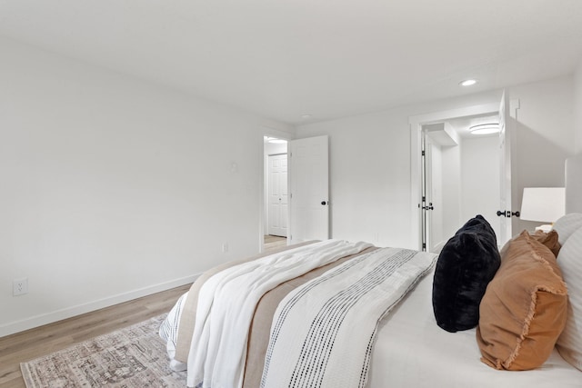 bedroom featuring light hardwood / wood-style floors