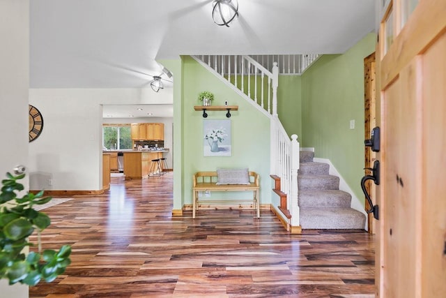 entrance foyer with dark hardwood / wood-style floors