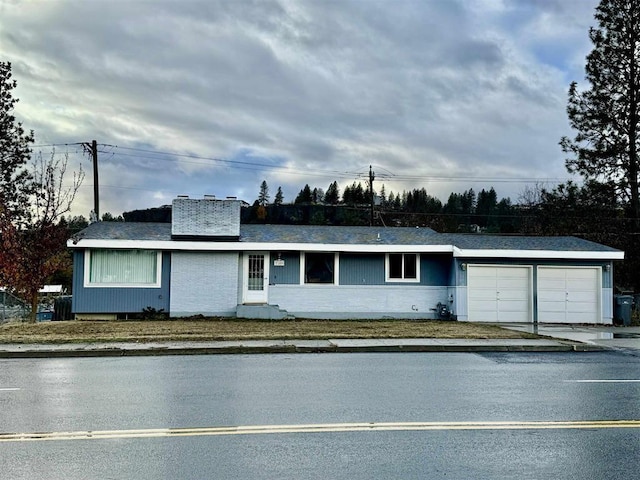 single story home featuring a garage