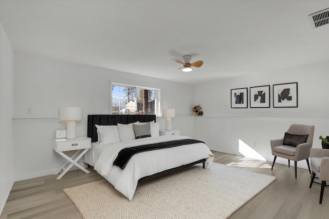 bedroom featuring ceiling fan and light wood-type flooring