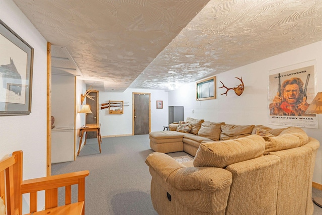 living room with a textured ceiling and carpet