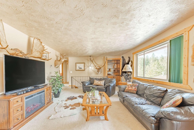 carpeted living room featuring a textured ceiling