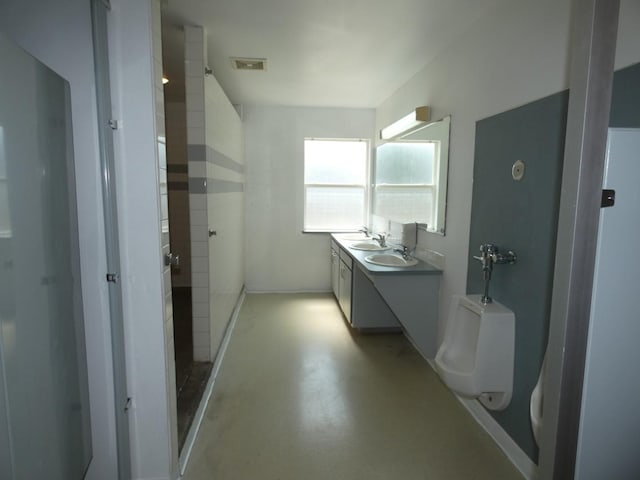 706 2nd St, Cheney, WA 99004 - bathroom with vanity, concrete flooring, and toilet