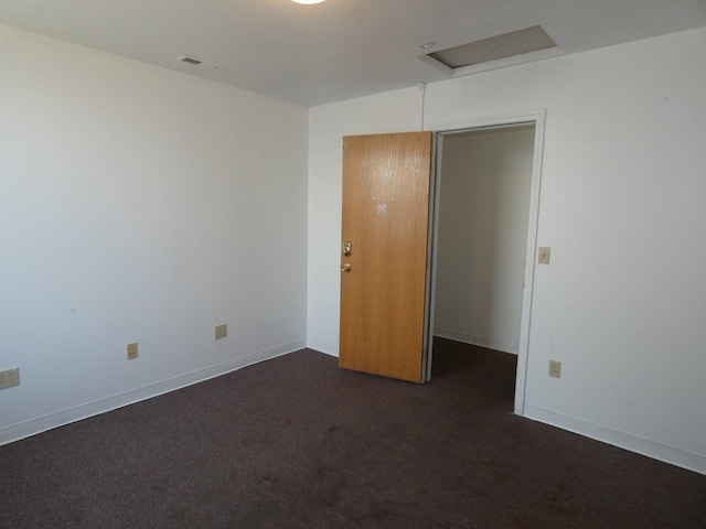 706 2nd St, Cheney, WA 99004 - spare room featuring dark colored carpet