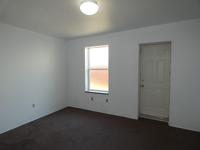 706 2nd St, Cheney, WA 99004 - empty room featuring dark colored carpet