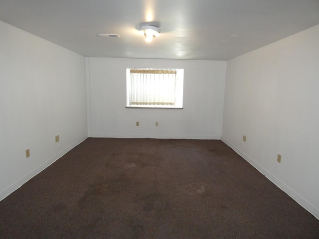 706 2nd St, Cheney, WA 99004 - spare room featuring dark colored carpet