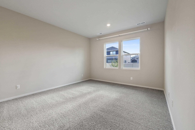 view of carpeted spare room