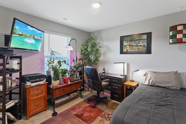 bedroom featuring carpet