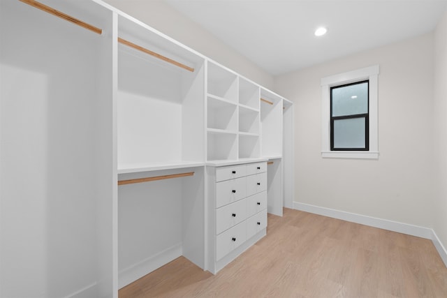 walk in closet featuring light wood-type flooring