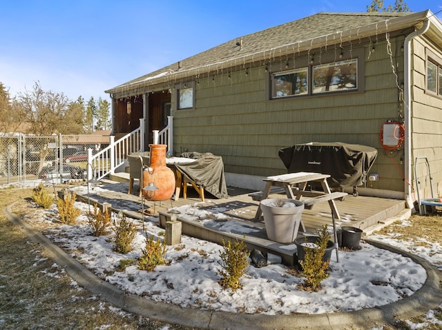 exterior space featuring a wooden deck