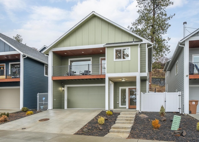 view of front of home featuring a balcony and a garage