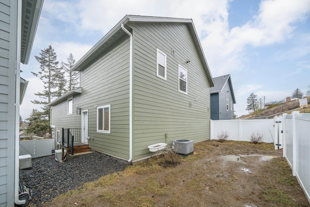 back of property with cooling unit