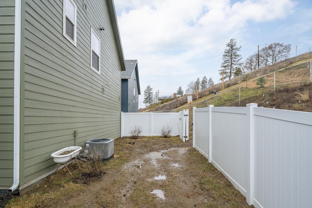 exterior space featuring central AC unit