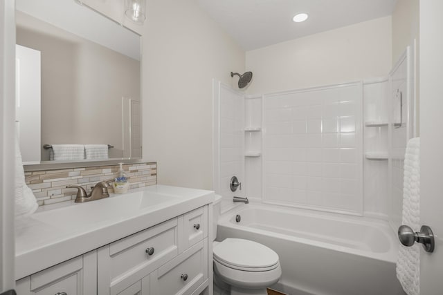 full bathroom featuring shower / bathtub combination, vanity, toilet, and backsplash