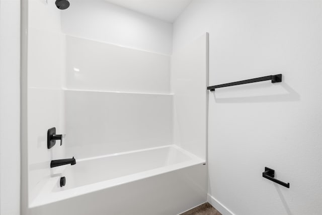 bathroom with shower / tub combination