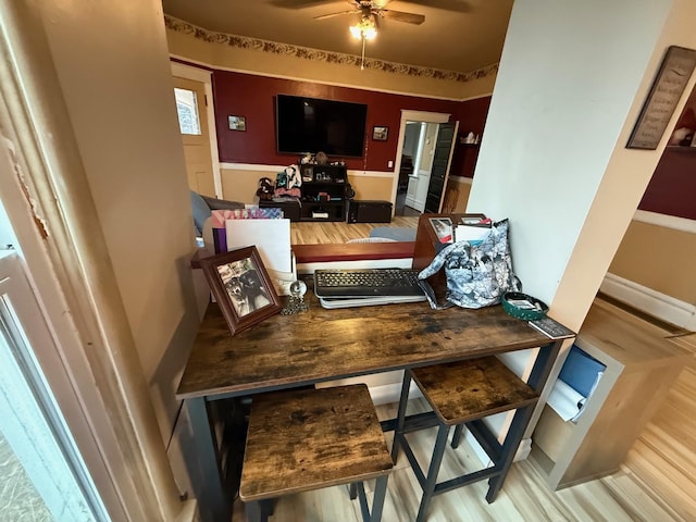 dining space featuring ceiling fan