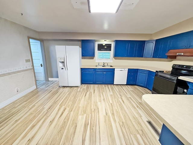 kitchen featuring blue cabinets, sink, white appliances, and light hardwood / wood-style flooring