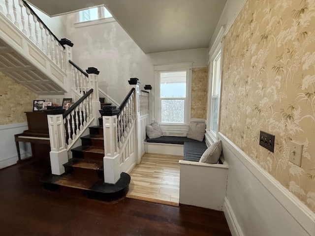 stairway featuring hardwood / wood-style flooring