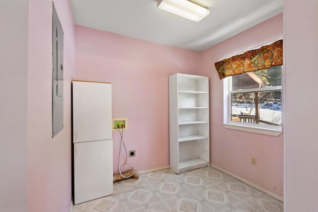 clothes washing area with washer hookup and hookup for an electric dryer