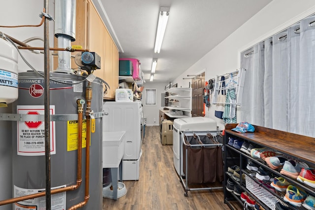 interior space featuring washing machine and dryer and gas water heater