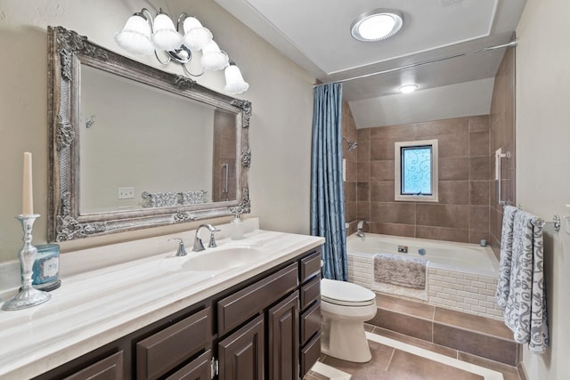 full bathroom featuring lofted ceiling, shower / bath combination with curtain, vanity, toilet, and tile patterned floors