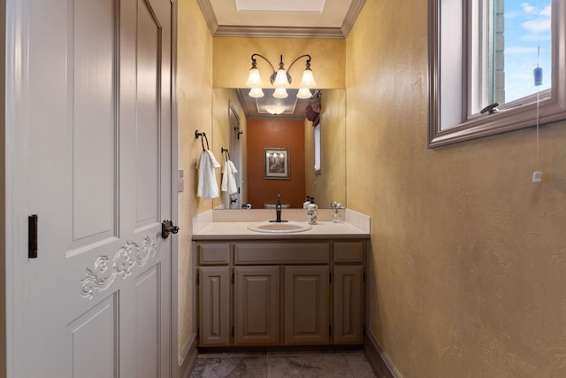 bathroom with vanity and ornamental molding