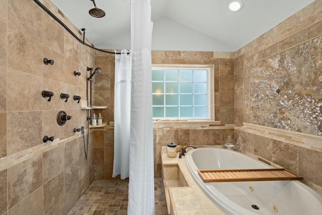 bathroom featuring vaulted ceiling and separate shower and tub
