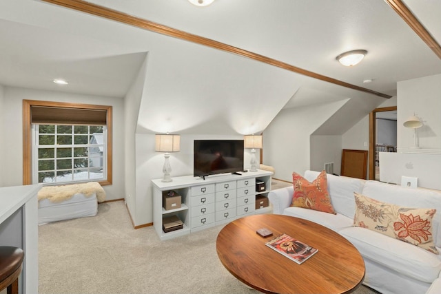 carpeted living room with lofted ceiling