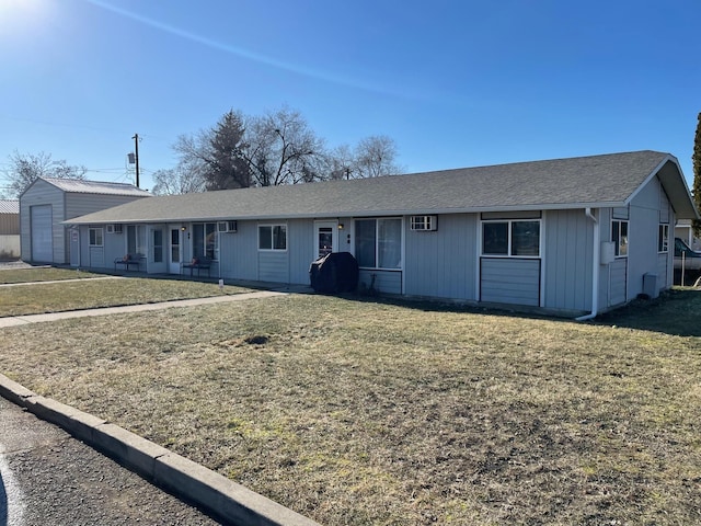 single story home with a garage and a front yard