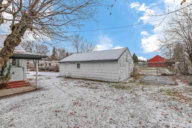 view of side of property with an outdoor structure