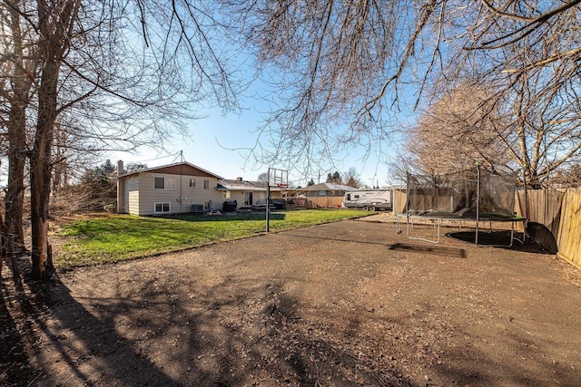 view of yard featuring a trampoline