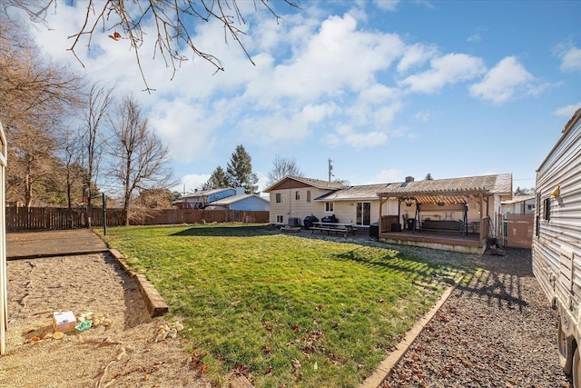 view of yard with a pergola and a patio area