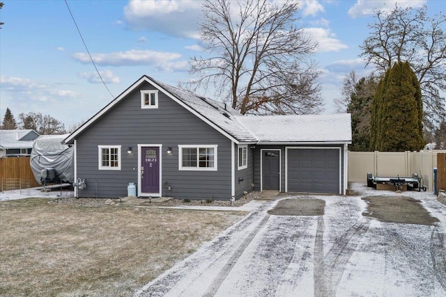 view of front of home with a garage