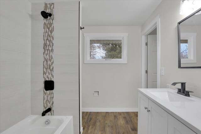 bathroom featuring hardwood / wood-style flooring and vanity