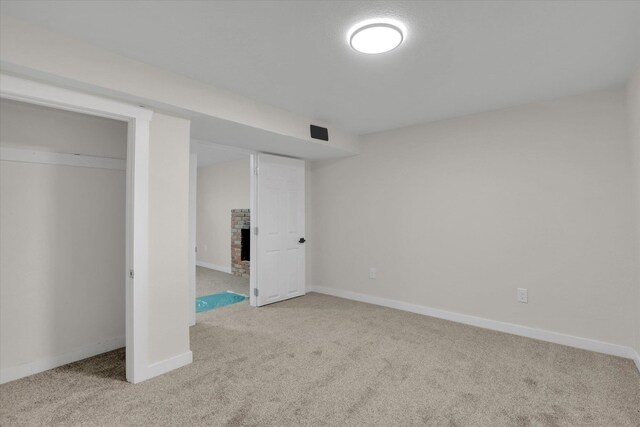 unfurnished bedroom featuring a closet and carpet flooring