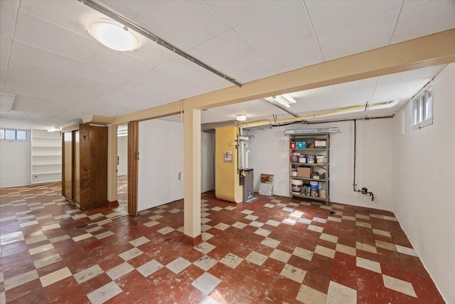 basement featuring heating unit