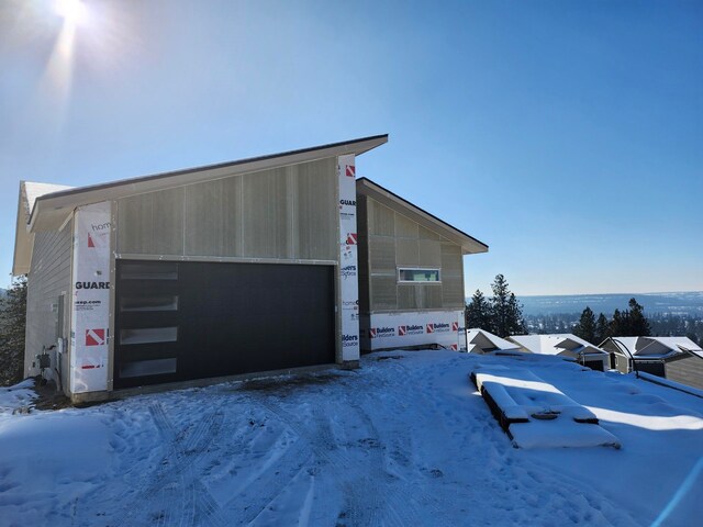 property in mid-construction featuring a garage