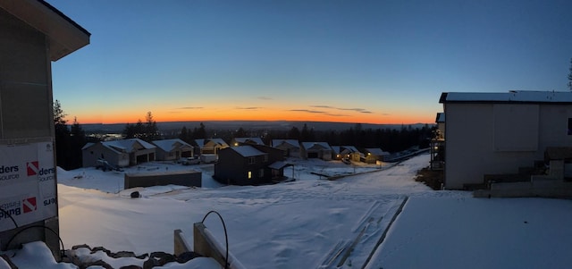 view of yard layered in snow