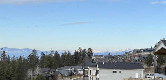 property view of mountains featuring a residential view